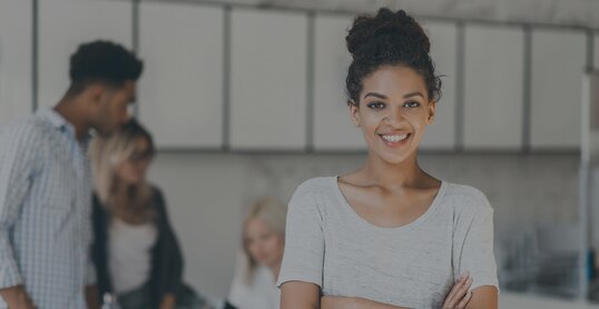 woman looks into camera it jobs timetoact group