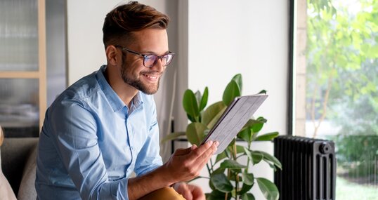 Young Man holding digital tablet